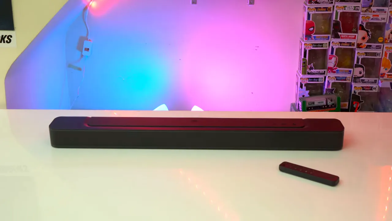 Comparison of soundbar profiles and wall-mount kits laid out on a table