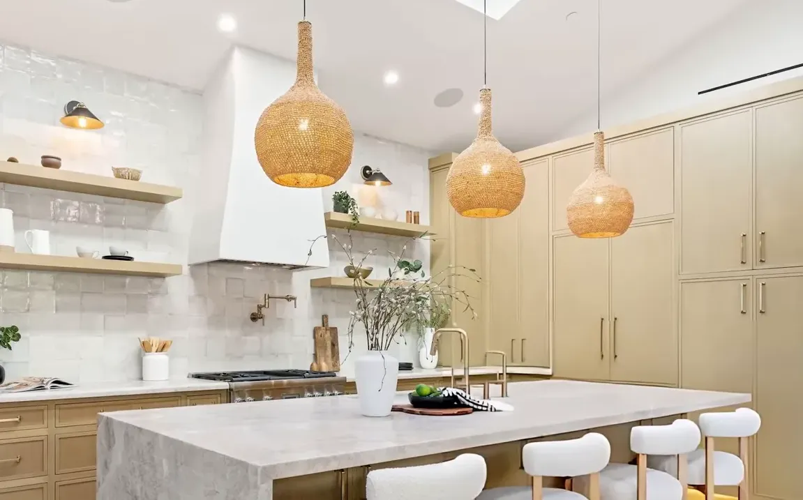 Layered lighting with sculptural rattan pendant and under-shelf LEDs